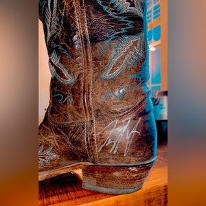 Justin Cowgirl Boots signed by Florida Georgia Line in 2012 at Coyote Joes Bar